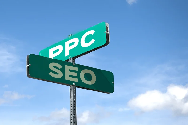 Intersecting Road Signs That Read PPC And SEO