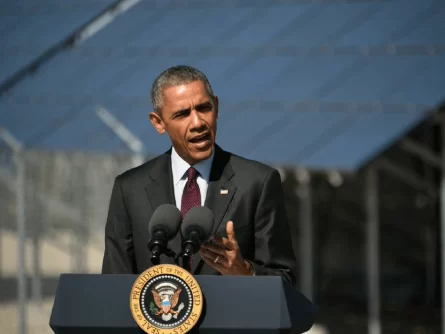 Barack Obama Standing At A Podium