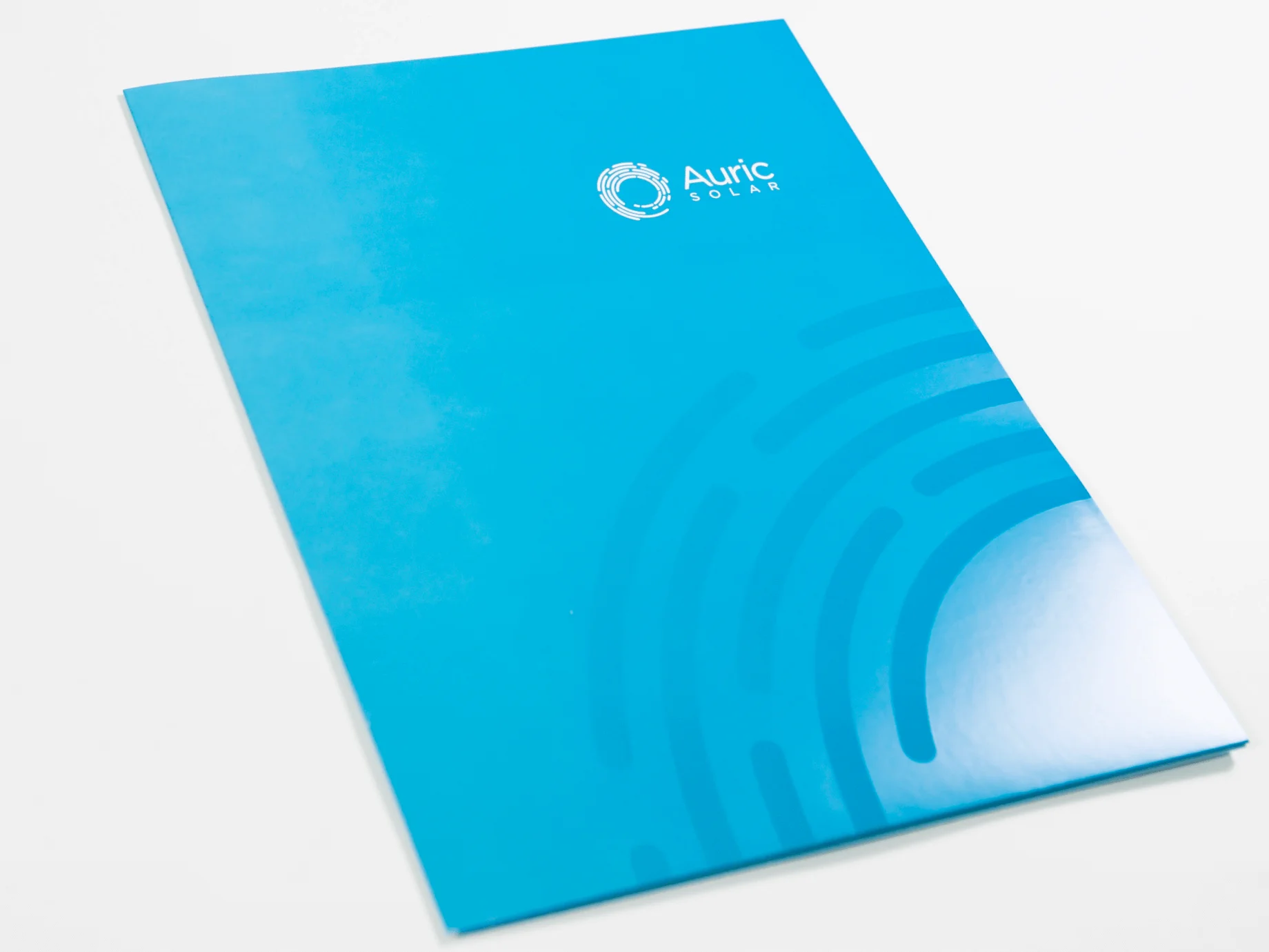 Blue Booklet With Auric Solar Logo