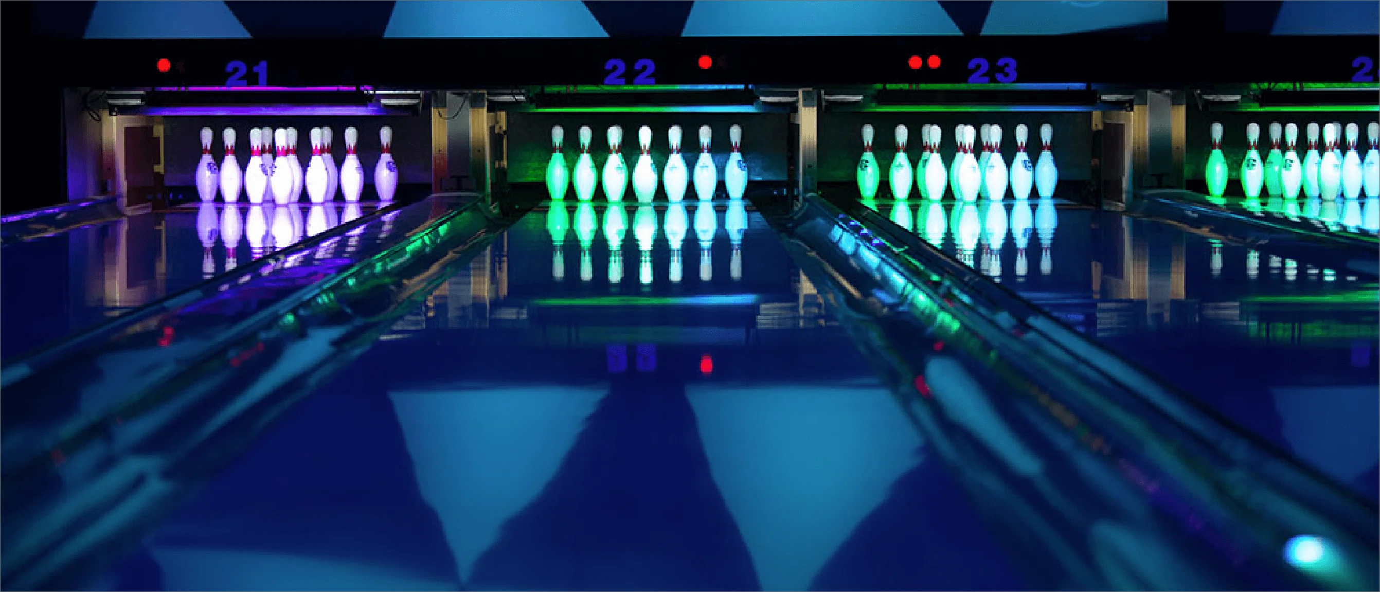 Pins And Ales Photography Of Bowling Lanes Glowing In Dark Lighting