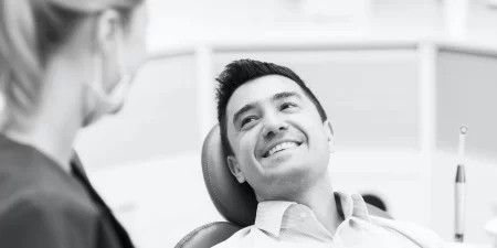Abundant Dental Care Man Smiling At Dentist