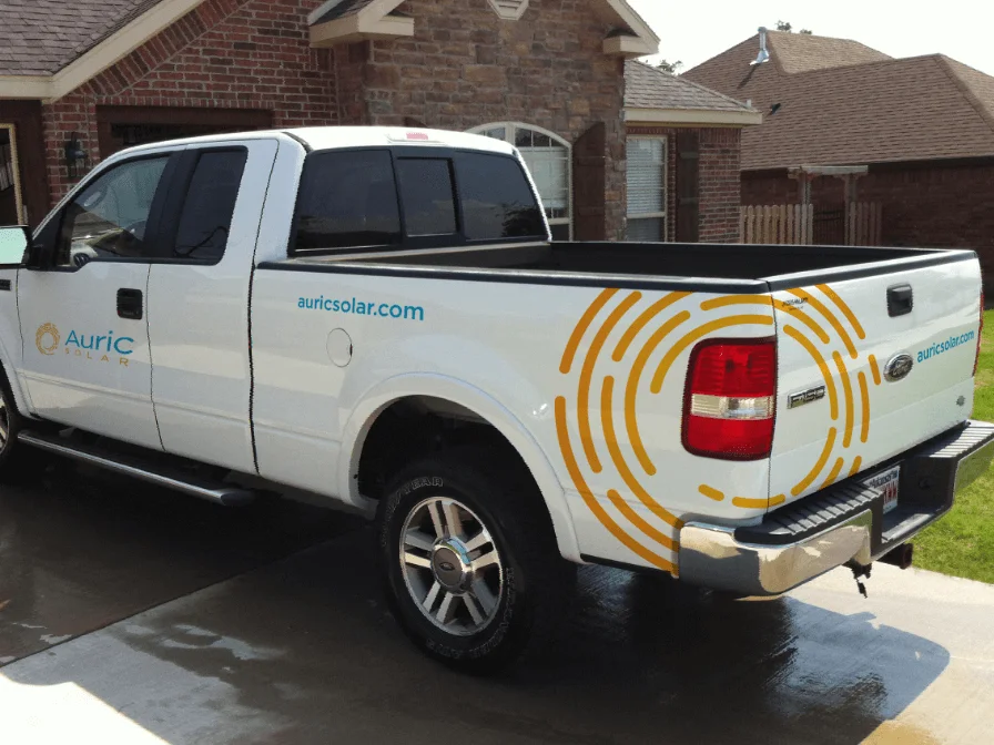 Auric Solar Truck Parked In A Client's Driveway